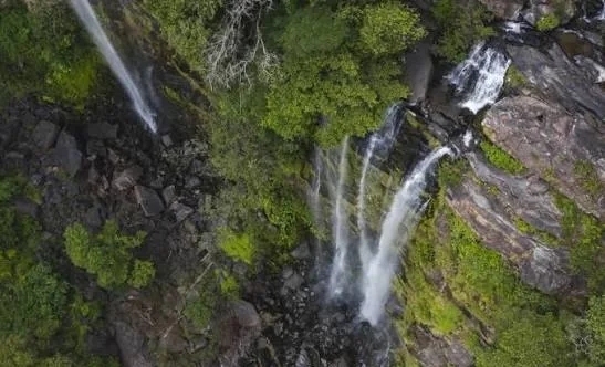 Aerial view of a waterfall in the karst forest near The Rock ViewPoint, Khammouane