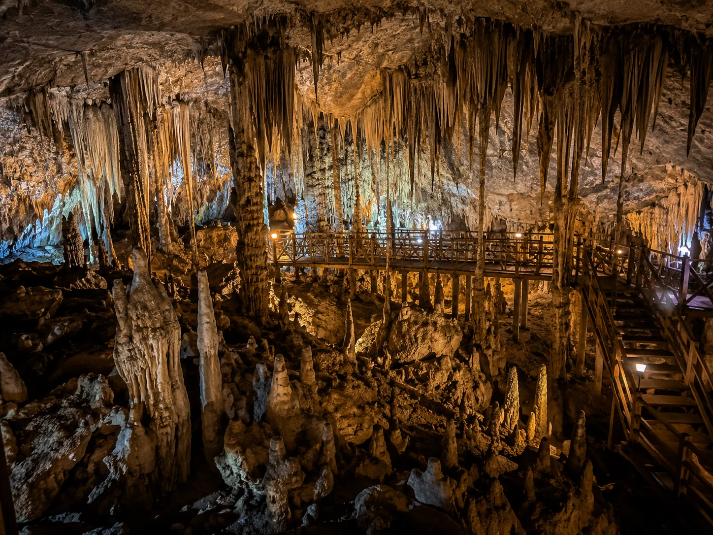 Illuminated stalactite chamber at Tham Pha Buddha Cave near Thakhek