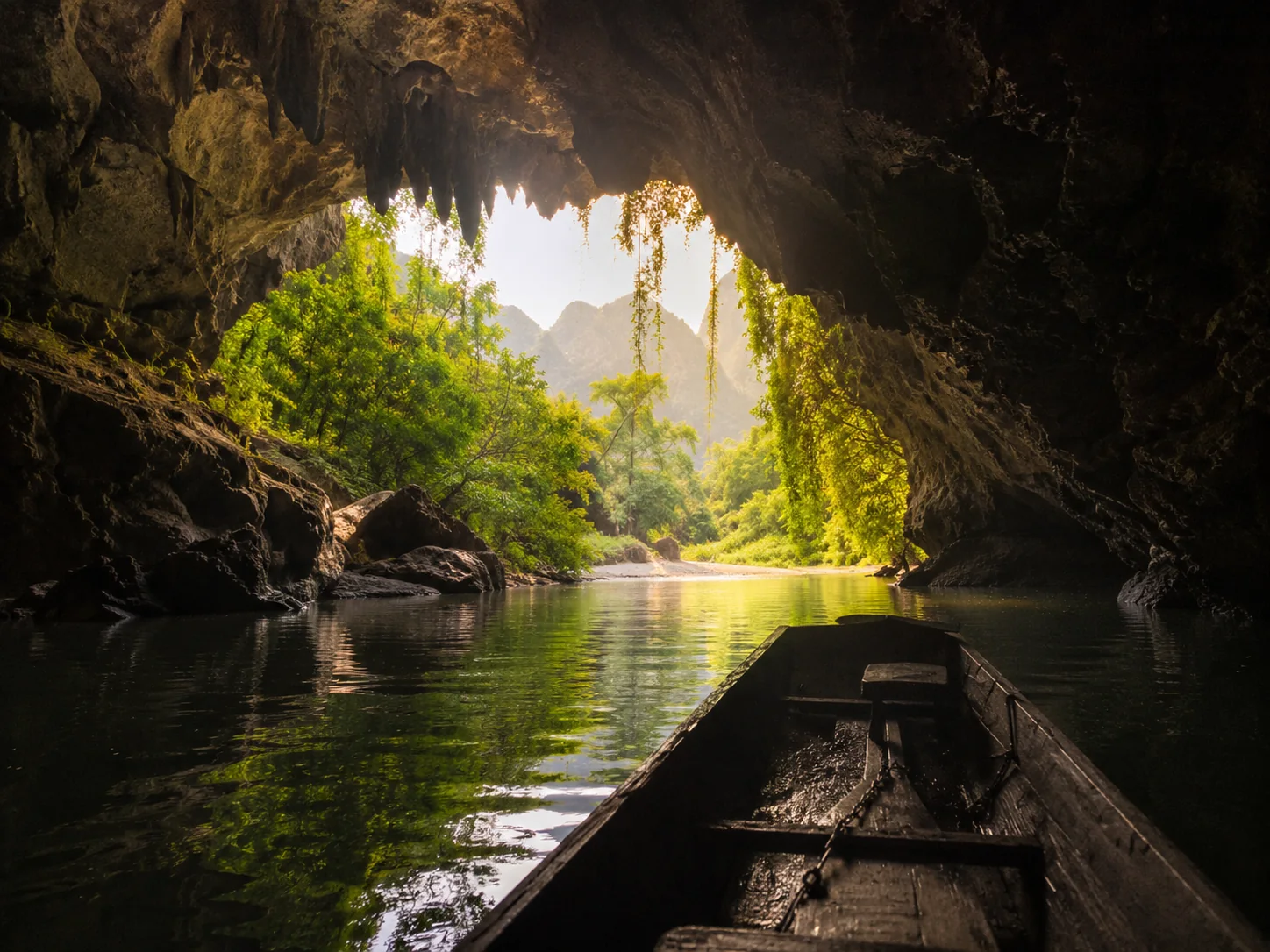 Boat at the river entrance of Tham Xiang Liap Cave near Thakhek